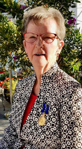 Judith Connors with her medal